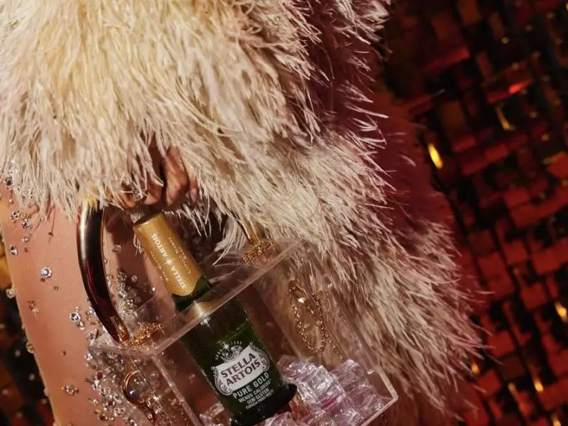 Stella Artois Pure Gold bottle inside a clear handbag at the Baile da Vogue